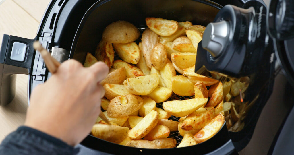 cooking potatoes using a chopstick and air fryer 