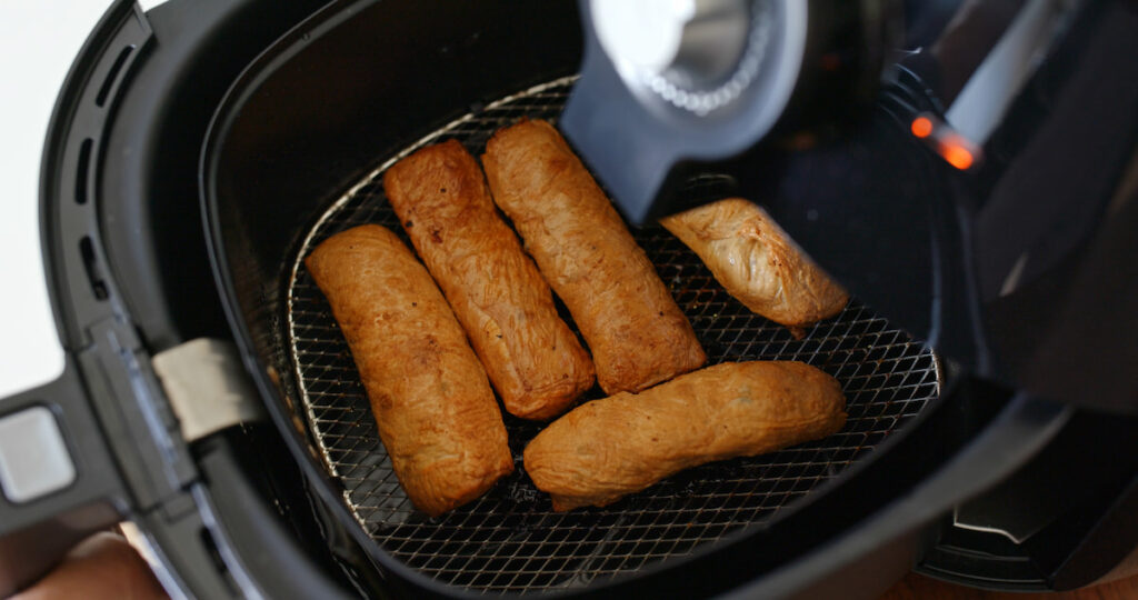 fish cake being cooked in an air fryer