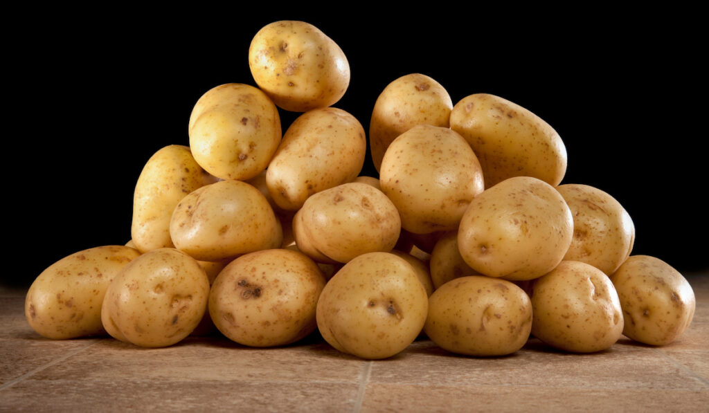 bunch of potatoes on the table
