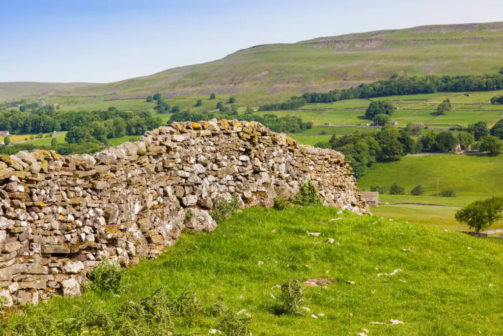 stone walls used as property marking in a field